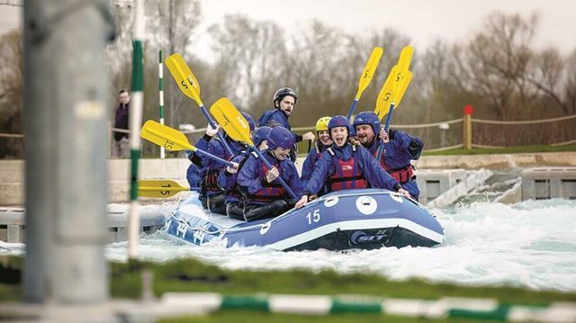 Photo of a group of people rafting